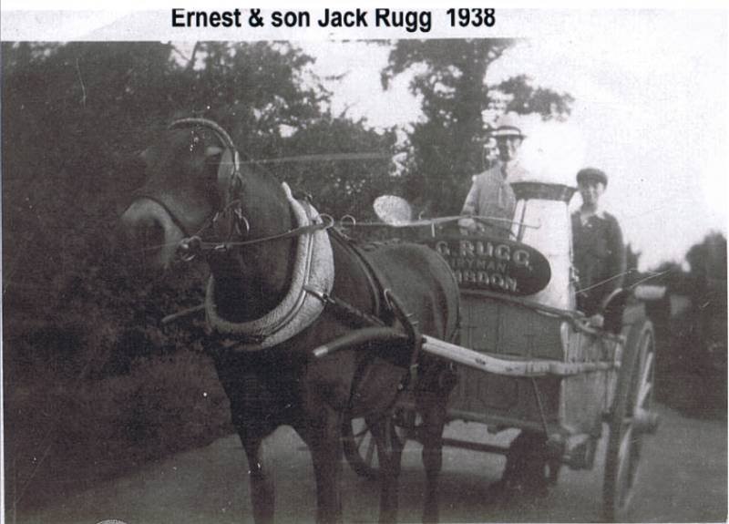 Archive photo of dairyman Ernest Rugg and his son Jack in their horse-drawn cart