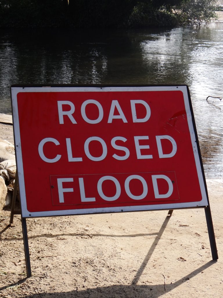 Road sign: Road closed flood